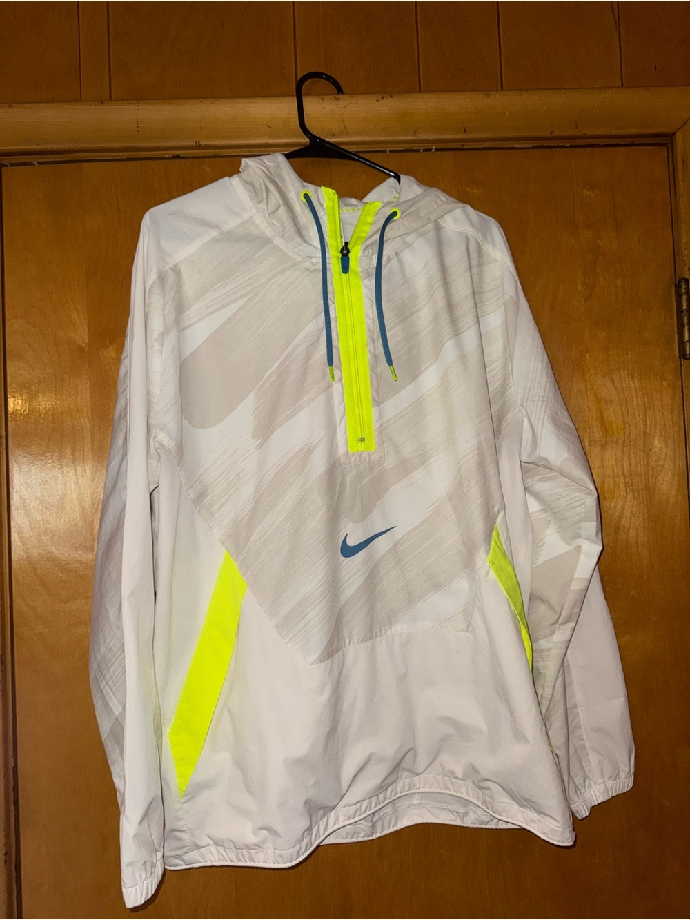 Nike White Windbreaker with Neon Yellow Accents and Blue Swoosh